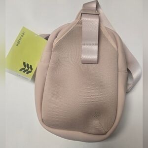 All In Motion Sling Crossbody Cream